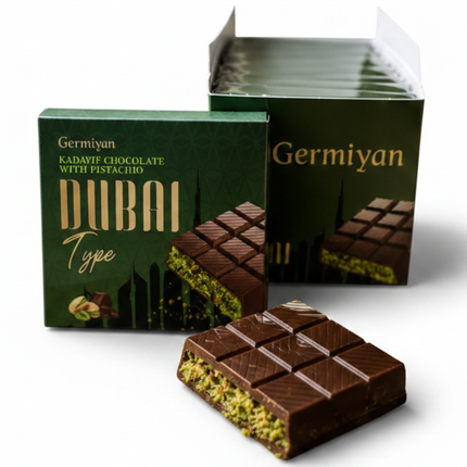 Schachtel und Schokoladentafel der Schokoladen-Kadayif mit Pistazien, braune Stücke
