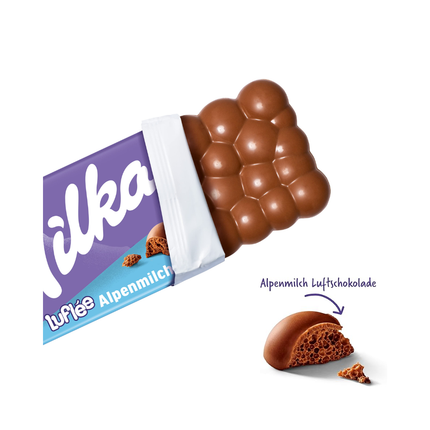 Milka Luflée Alpenmilch Luftschokolade mit abgebrochenen Stücken