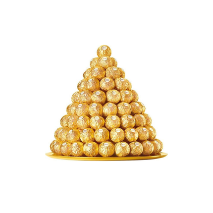 Ferrero Rocher Pralinen-Turm aus goldenen Kugeln auf einem Teller